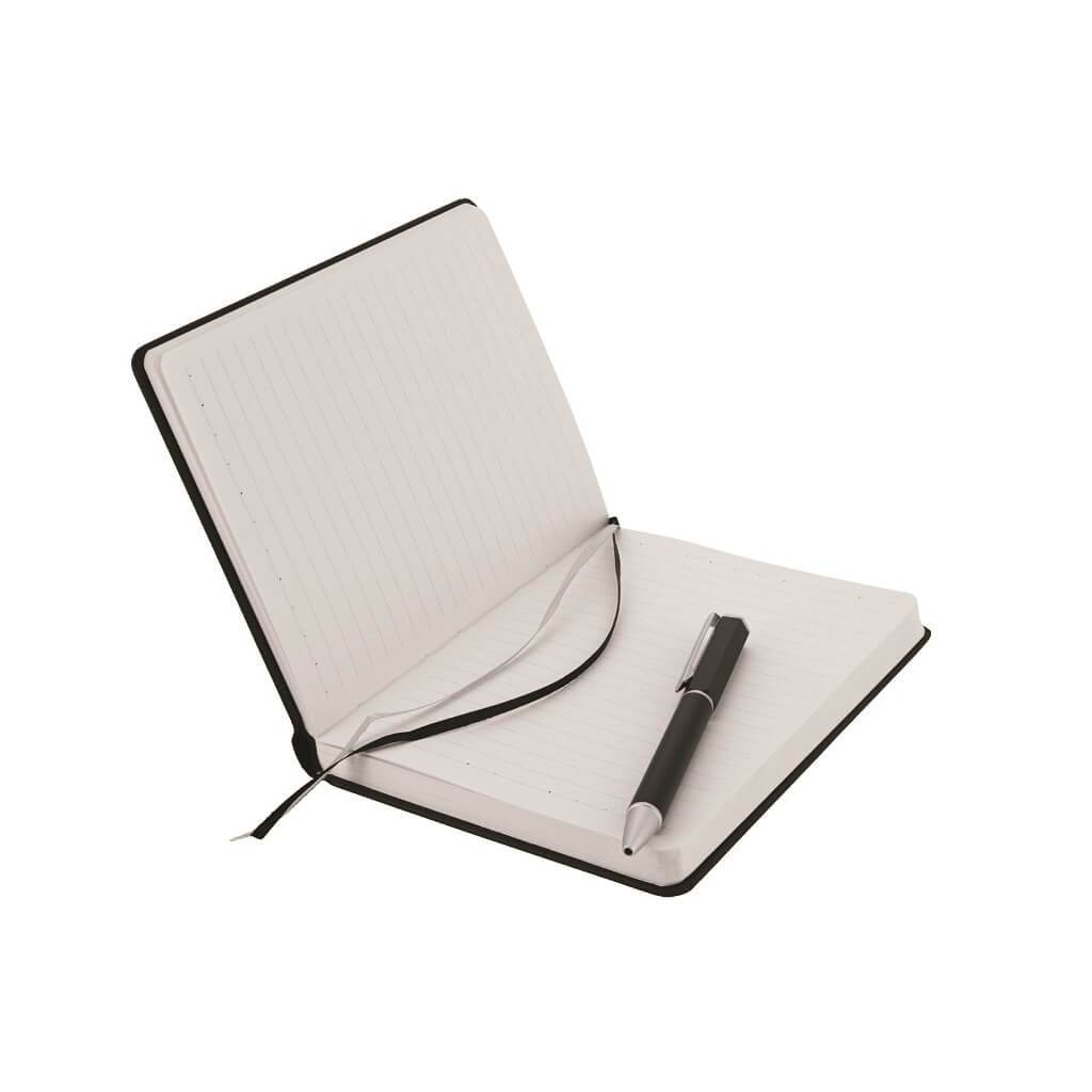 An open black notebook showing its bookmark with a black ballpoint pen over the open page