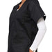 Close-up torso of model wearing a black scrub top